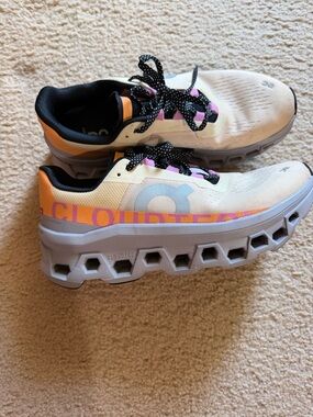 On Running Kids Sneakers in Cream with Orange & Pink Accents